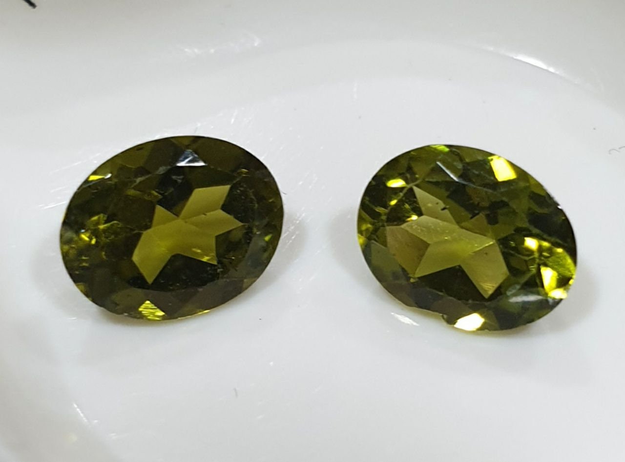 1 Matching Pair Arizona Peridot Olivine Oval Cut  9x7mm - Deep Color  Untreated Gemstone