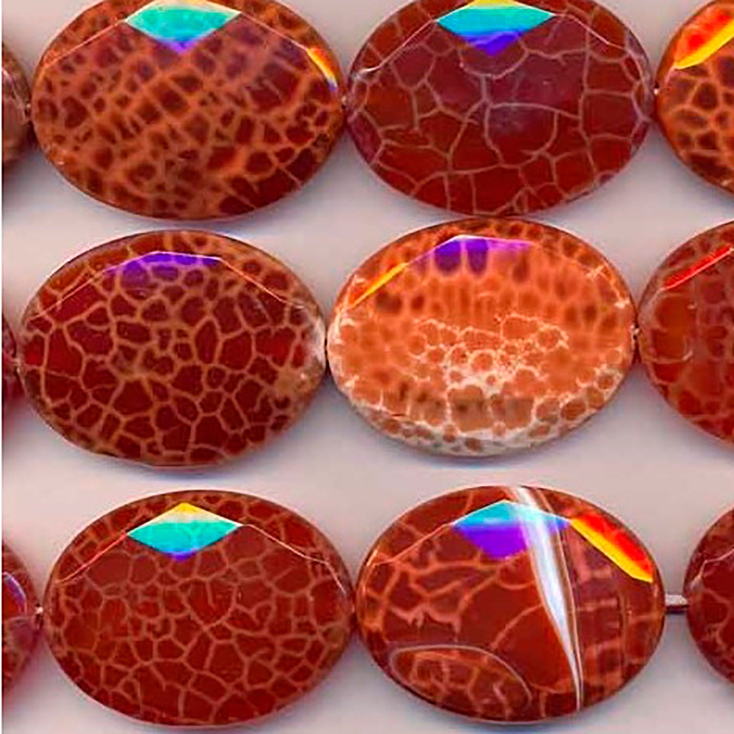 Cuentas ovaladas facetadas de ágata de fuego de 40 x 30 mm (16") - Hilo de 40 cm