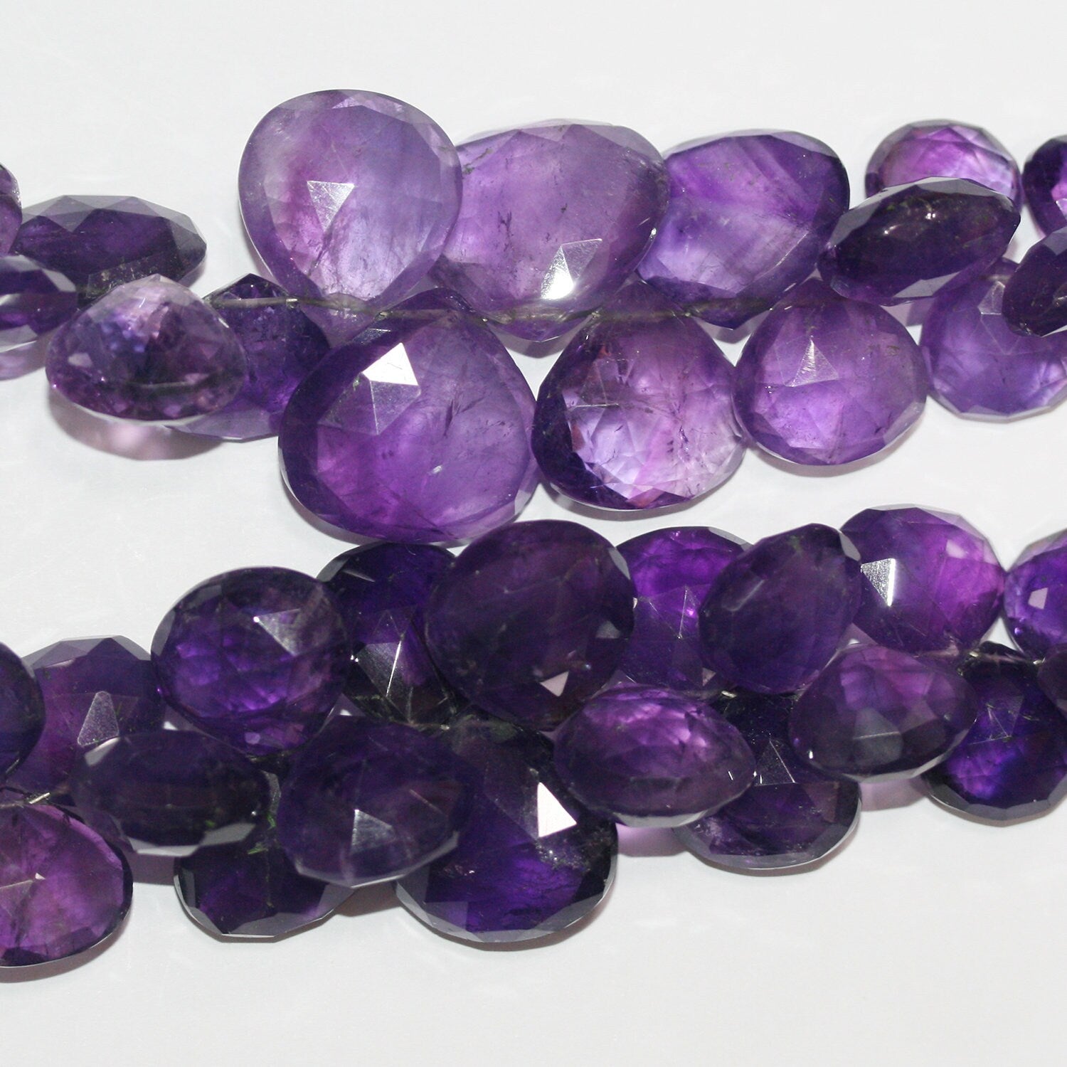 10" St Amethyst Graduated Faceted Drop Beads 13-20mm. Approx.- Strand 27cm.