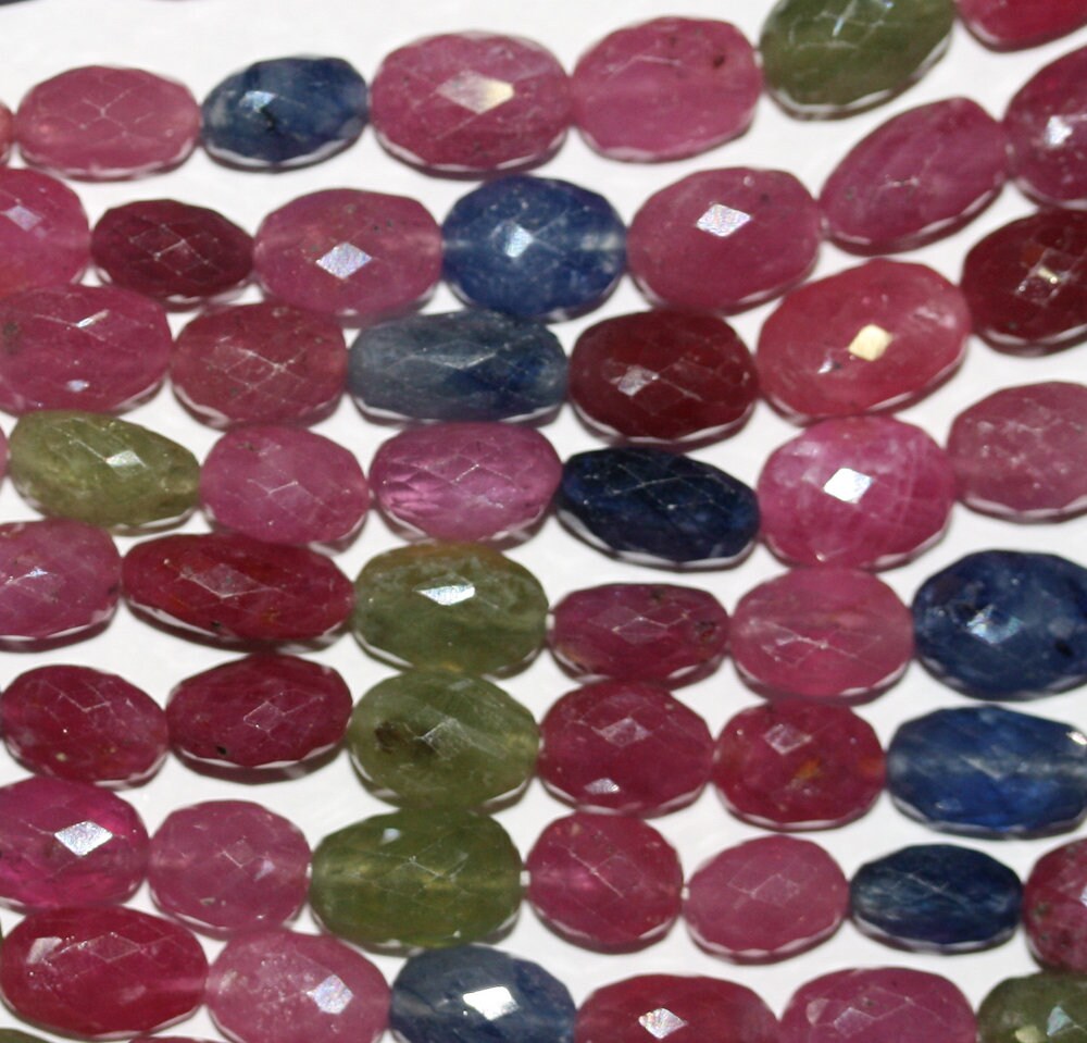 Cuentas de barril facetadas graduadas de zafiro StMulti de 16" de 8 x 5-10 x 7 mm.