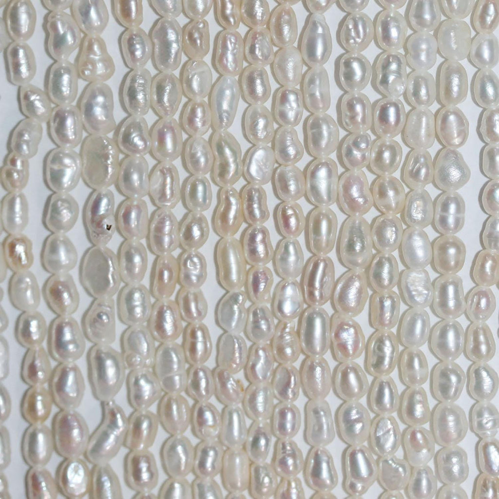 Perla de agua dulce ovalada de 35 cm, 3-4 mm, tira de 35 cm. Precios al por mayor.
