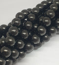 Brin de perles rondes en lignite naturelle de 8 mm, longueur 40 cm (15 pouces).