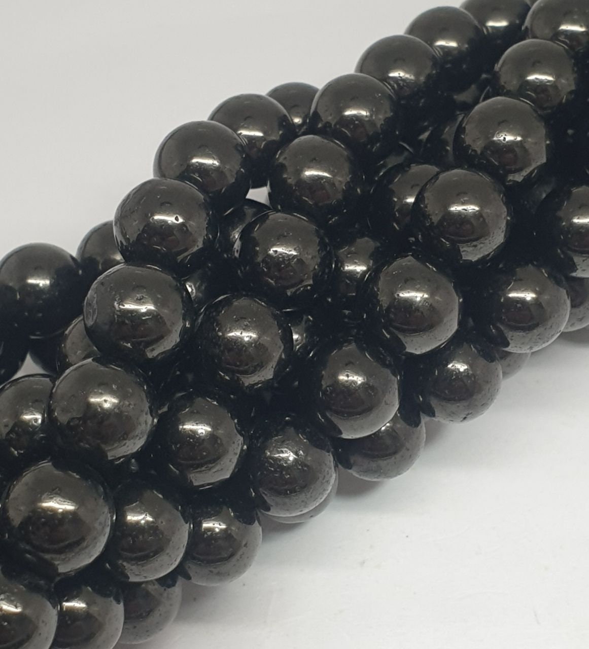 Brin de perles rondes en lignite naturelle de 8 mm, longueur 40 cm (15 pouces).