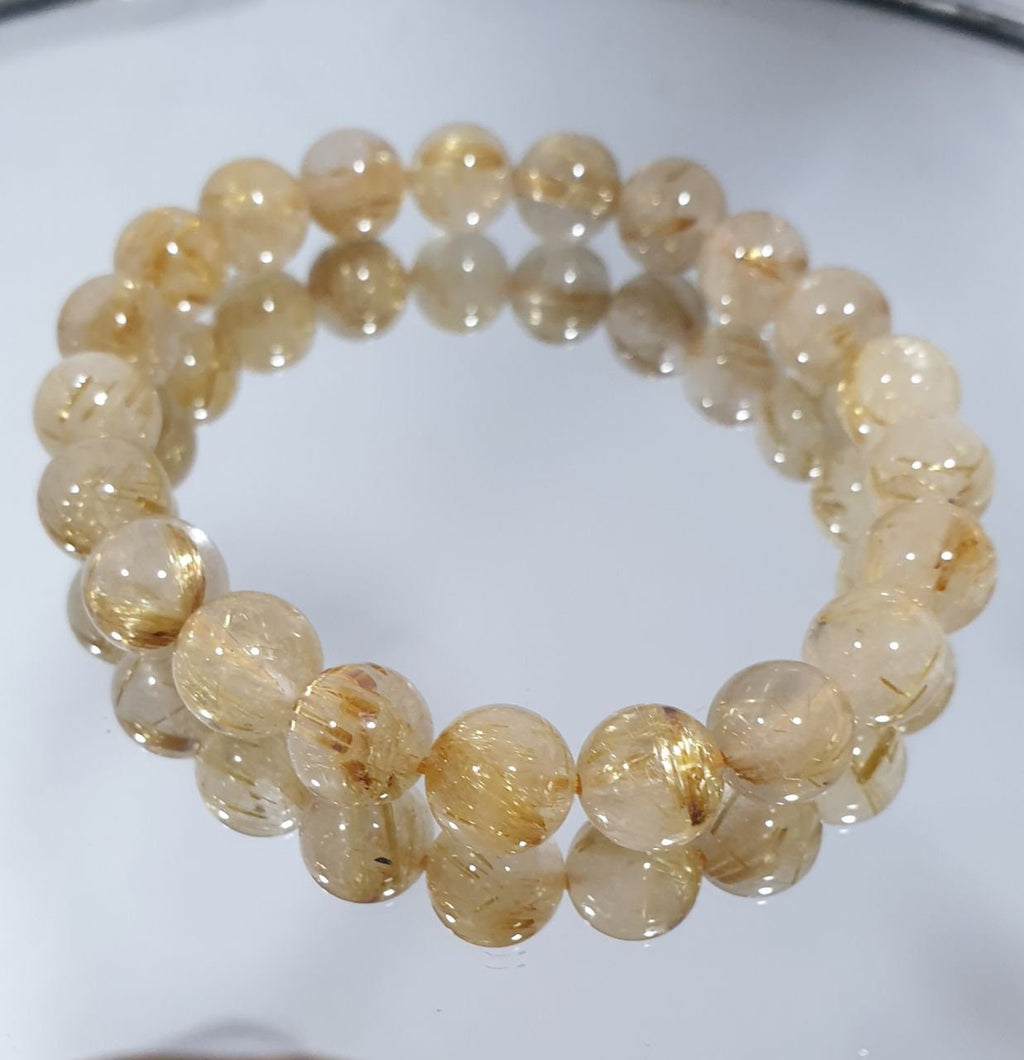 Pulsera elástica de cuarzo rutilado con cuentas de 9 mm - Proveedor de joyas con cuentas perforadas - Poder curativo - Gemas naturales