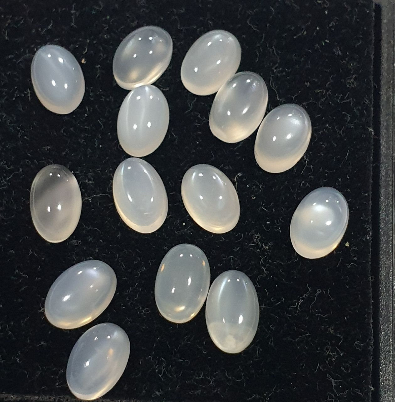 14 Pcs Lot White Moonstone Oval Cabochon 6x4mm. (14 pcs.)