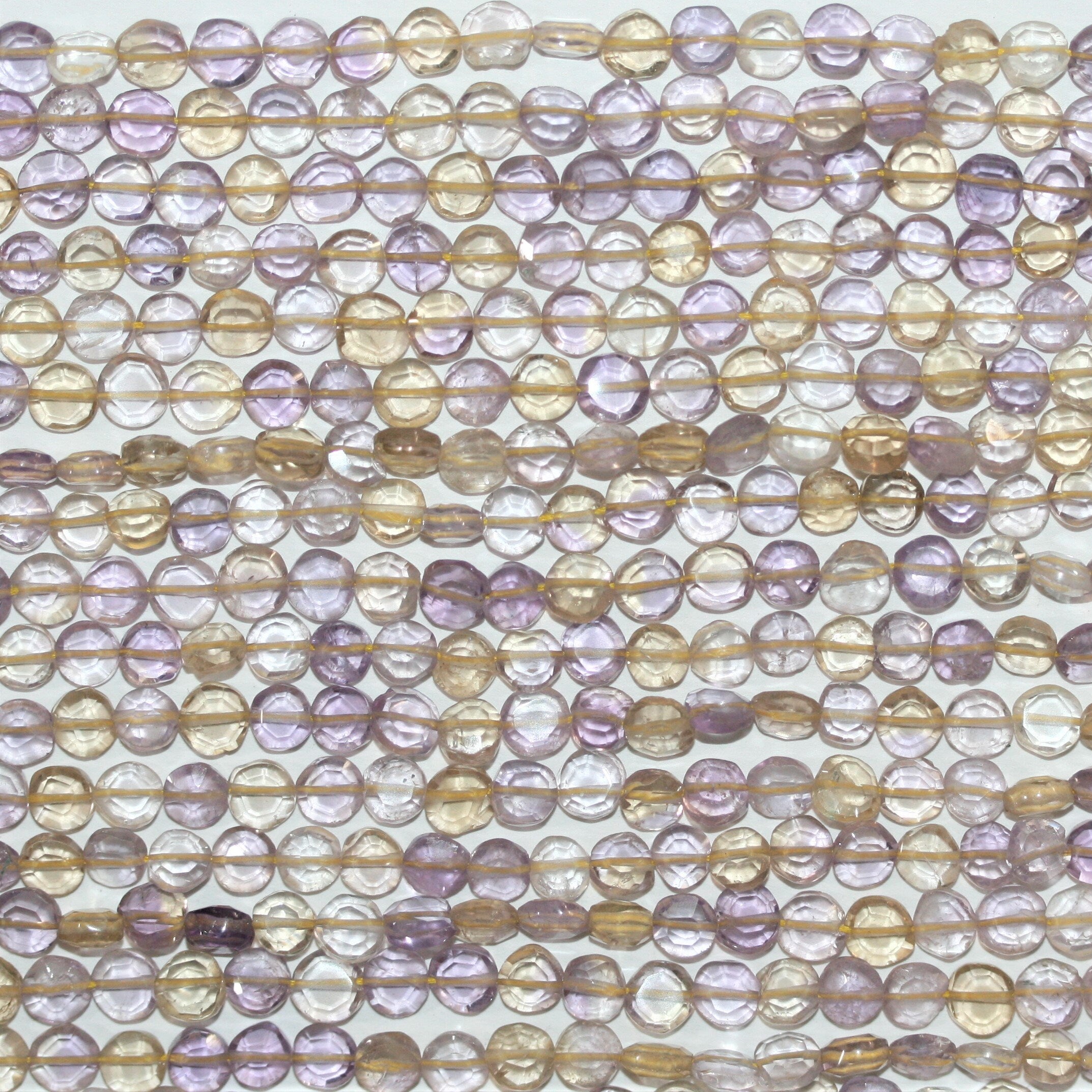 13" St Ametrine Faceted Coin Beads 5-6mm.- Strand 34cm.