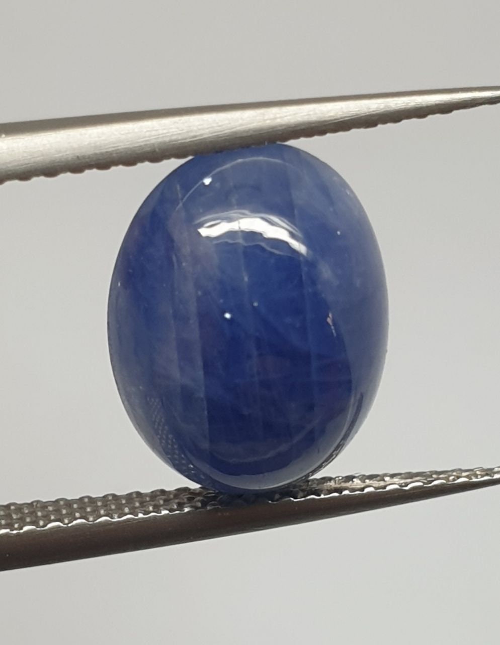 Natural   Blue Sapphire Oval Cabochon 12.5x9.7mm. (7.2ct.)