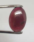 Grenat almandin ovale lisse, cabochon 18 x 13 mm (11,4 ct). Extrait de la terre.
