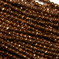 Cuentas redondas facetadas de hematita marrón de 16" (2 mm) - Hilo de 40 cm