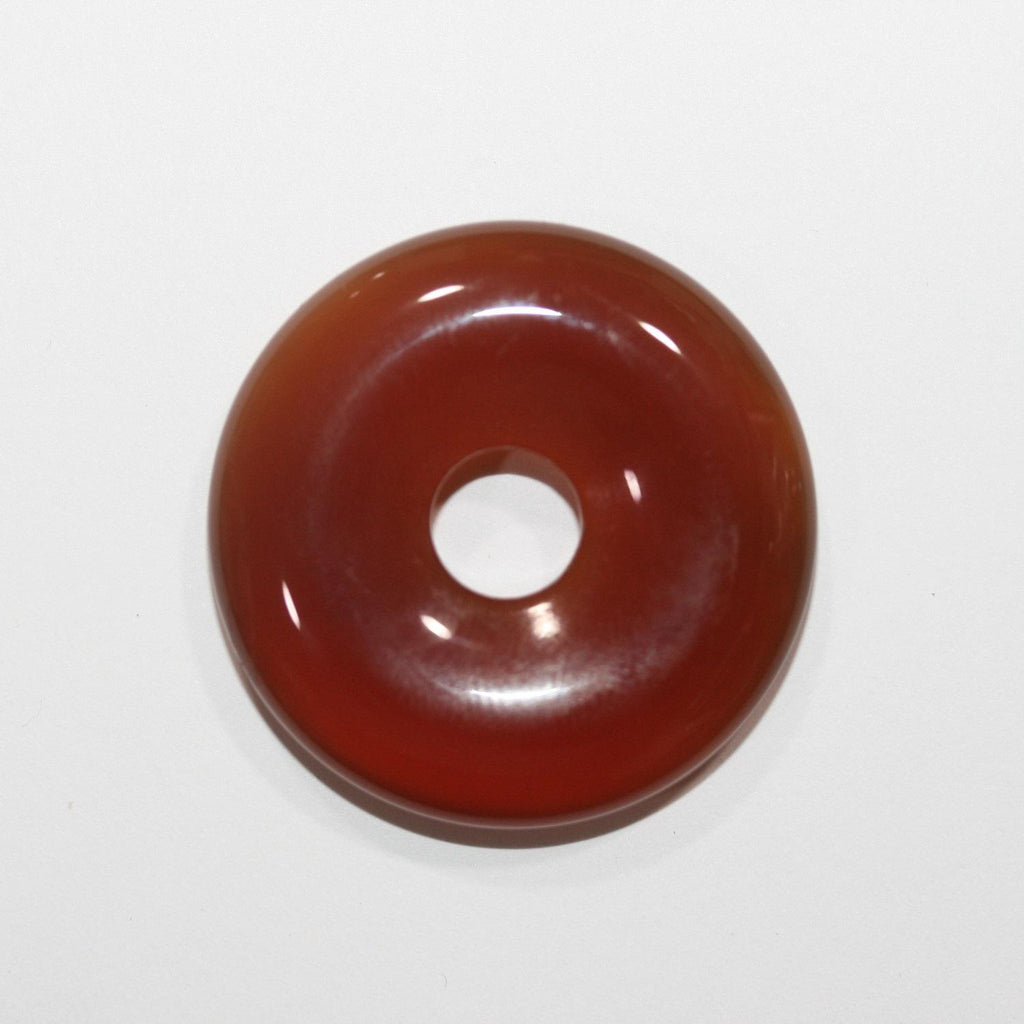 Pendentif en cornaline lisse en forme de donut, 30 mm. - Réf. 14852