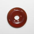 Pendentif en cornaline lisse en forme de donut, 30 mm. - Réf. 14852