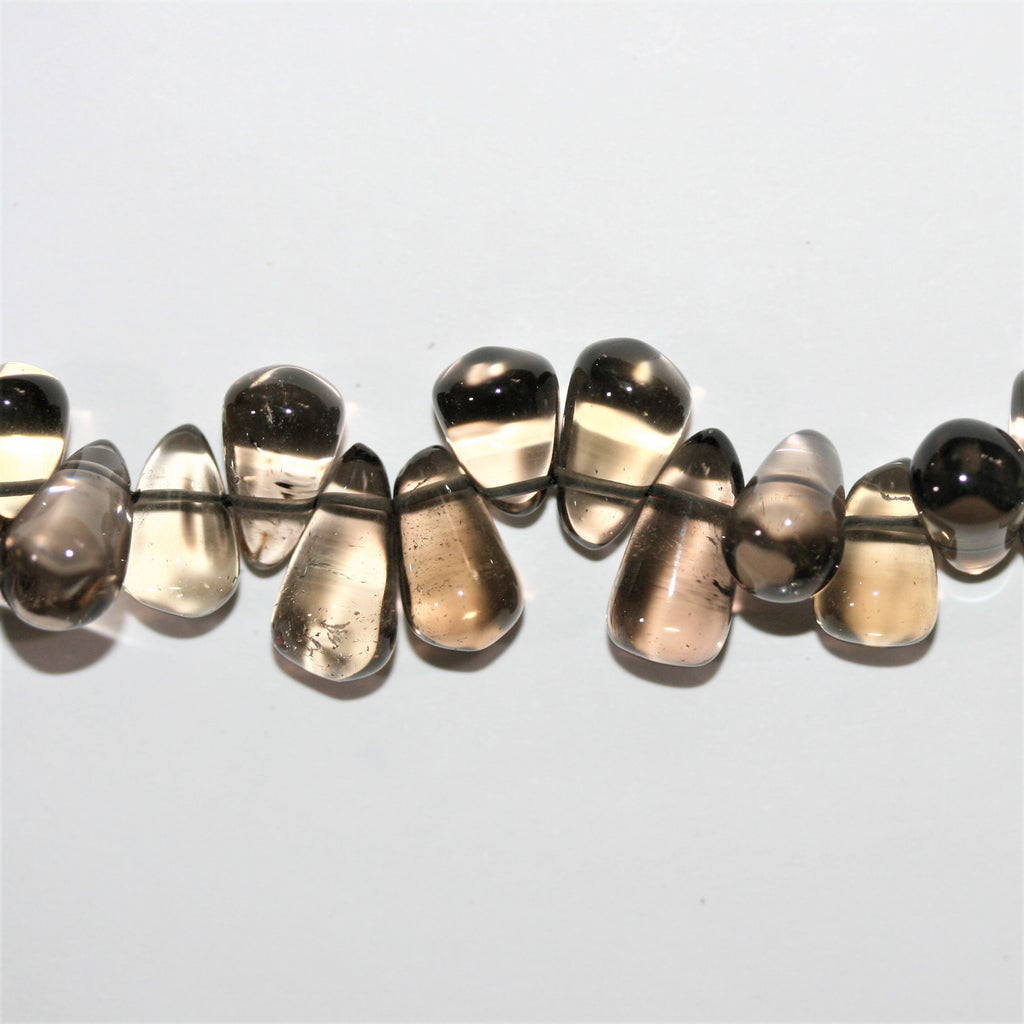 Perles en quartz fumé lisses en forme de goutte 12x7mm.- Fil 37cm.