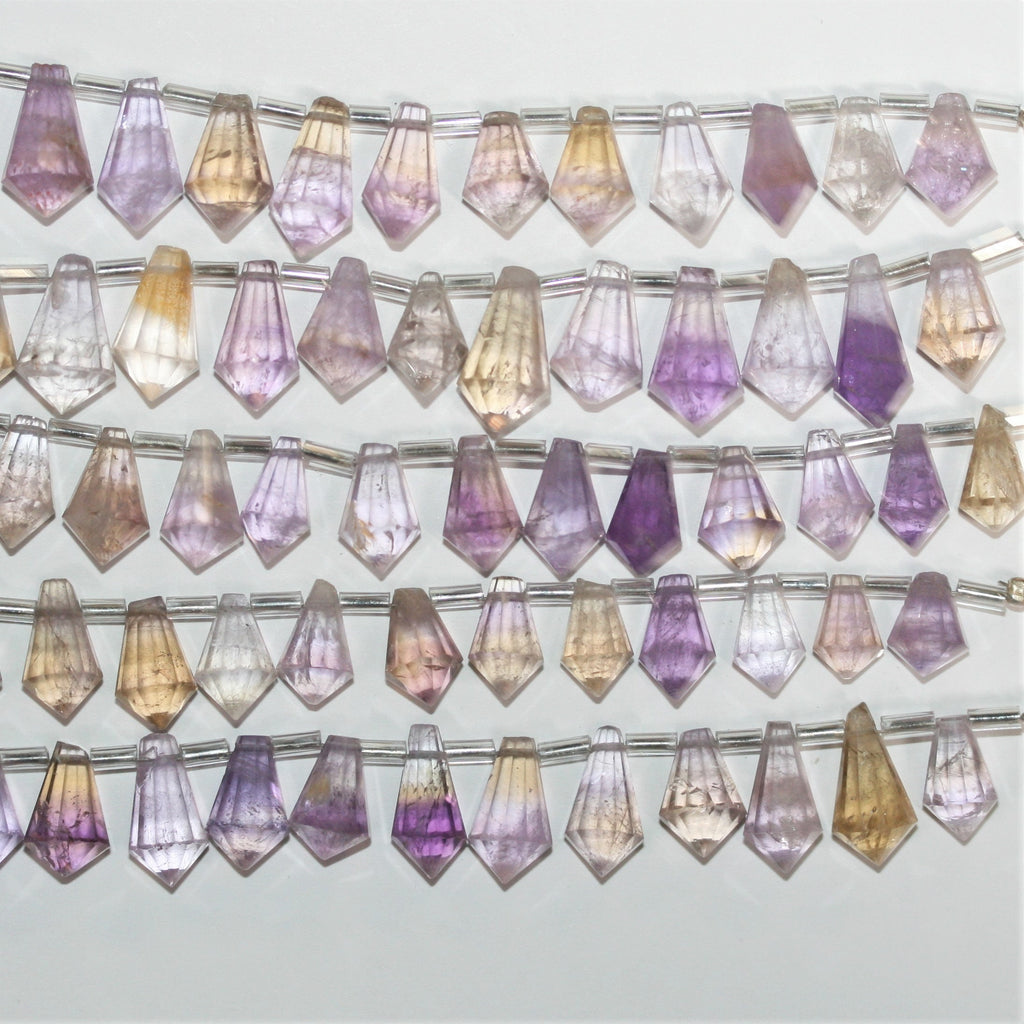 Cuentas facetadas de amatista de 5", 13 x 7 mm. Longitud aproximada: 14 cm.