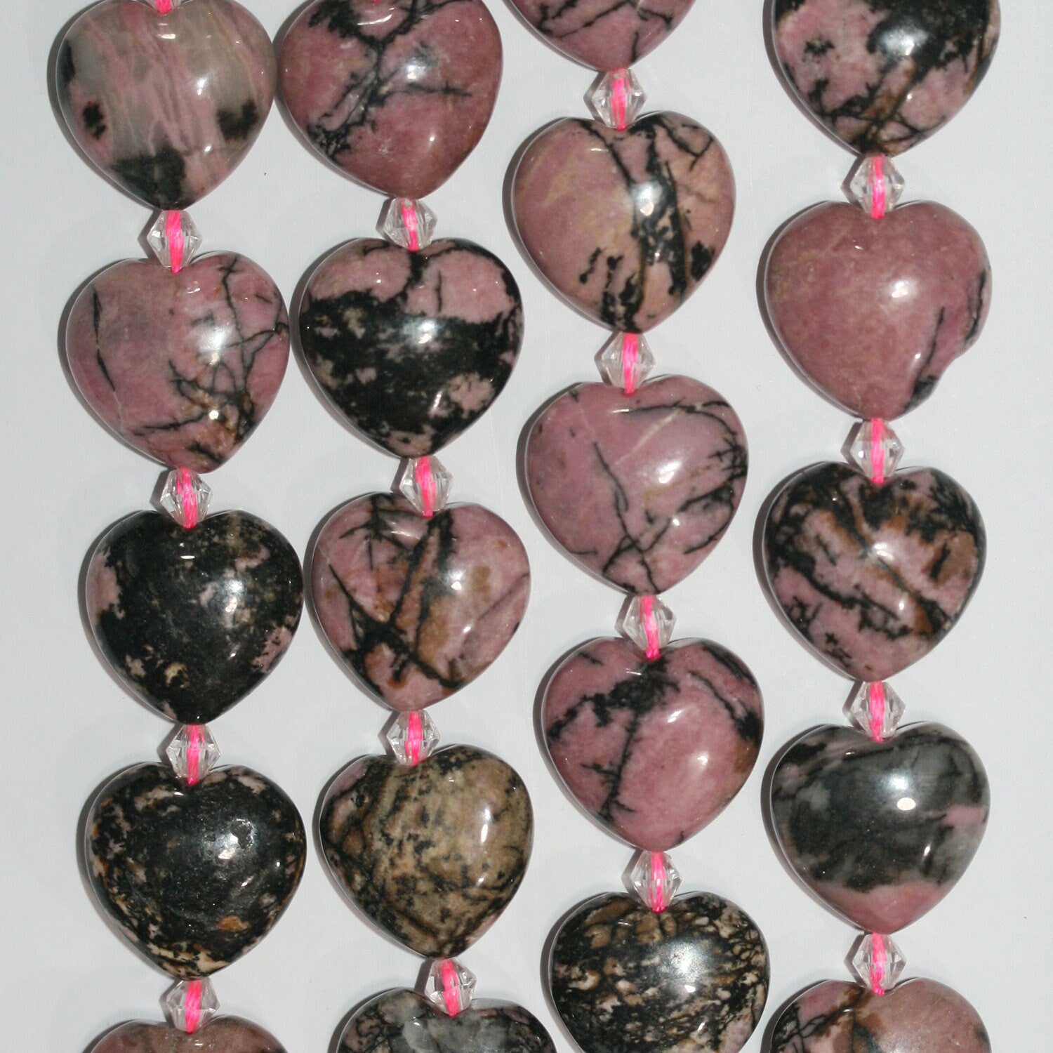 Cuentas de corazón lisas de rodonita de 16" (20 mm) - Hilo de 40 cm