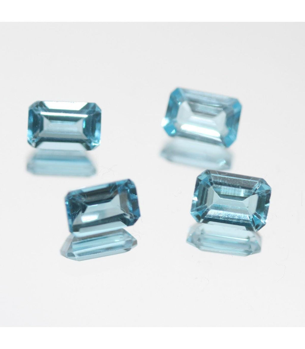 Lote de 4 piezas de topacio azul suizo facetado octogonal de 6 x 4 mm. (4 piezas)