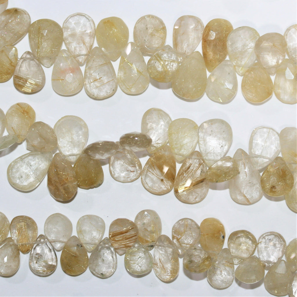 Cuentas de cuarzo rutilado facetadas de 9" x 12 x 10 mm. Aprox. - Hilo de 22 cm.
