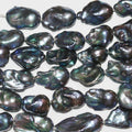 Perla Barroca Gris de Agua Dulce de 16" (24 x 15 mm). Hilo aproximado de 40 cm. Precios al por mayor.