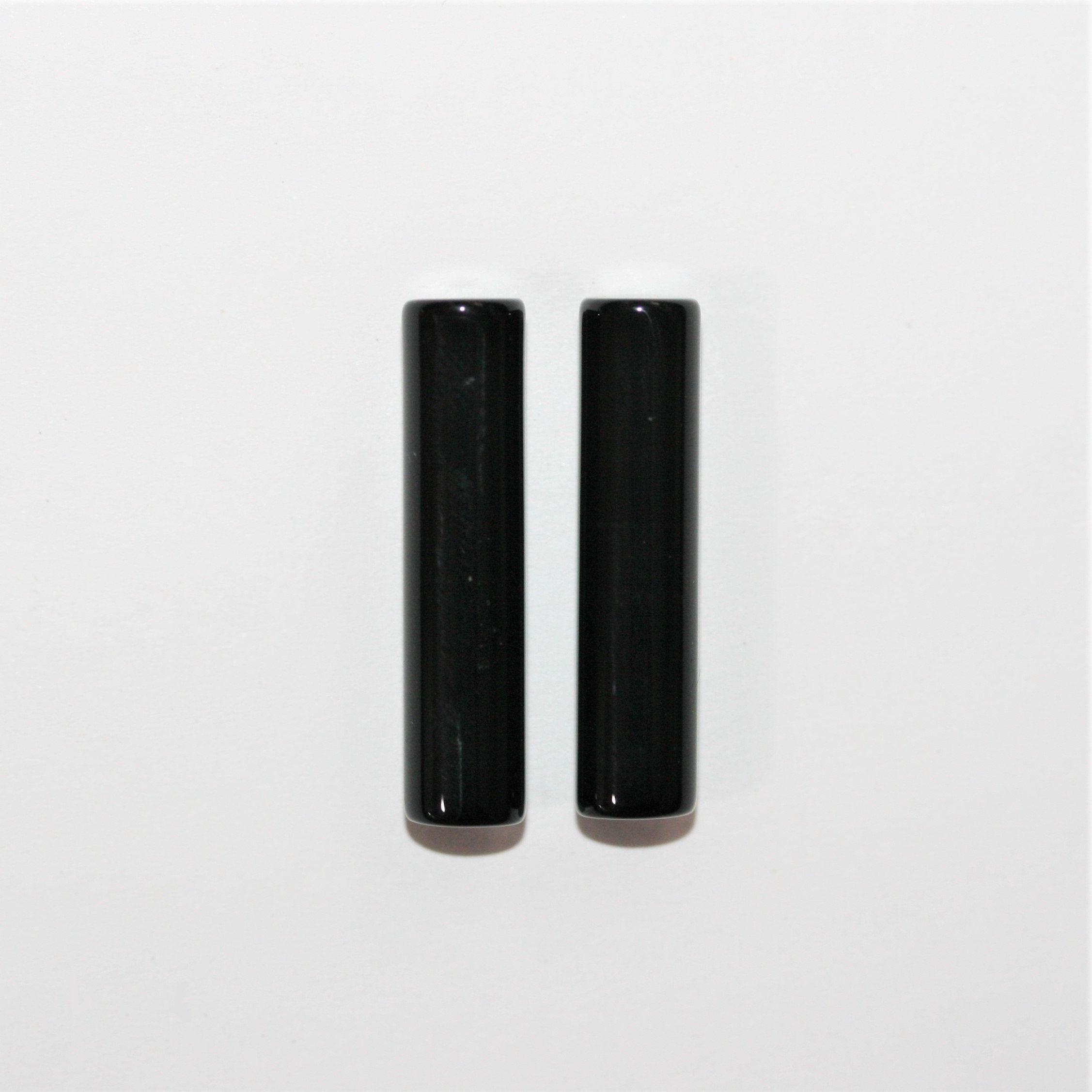 Cilindro liso semiperforado de ónix de 25 x 6 mm - 1 par