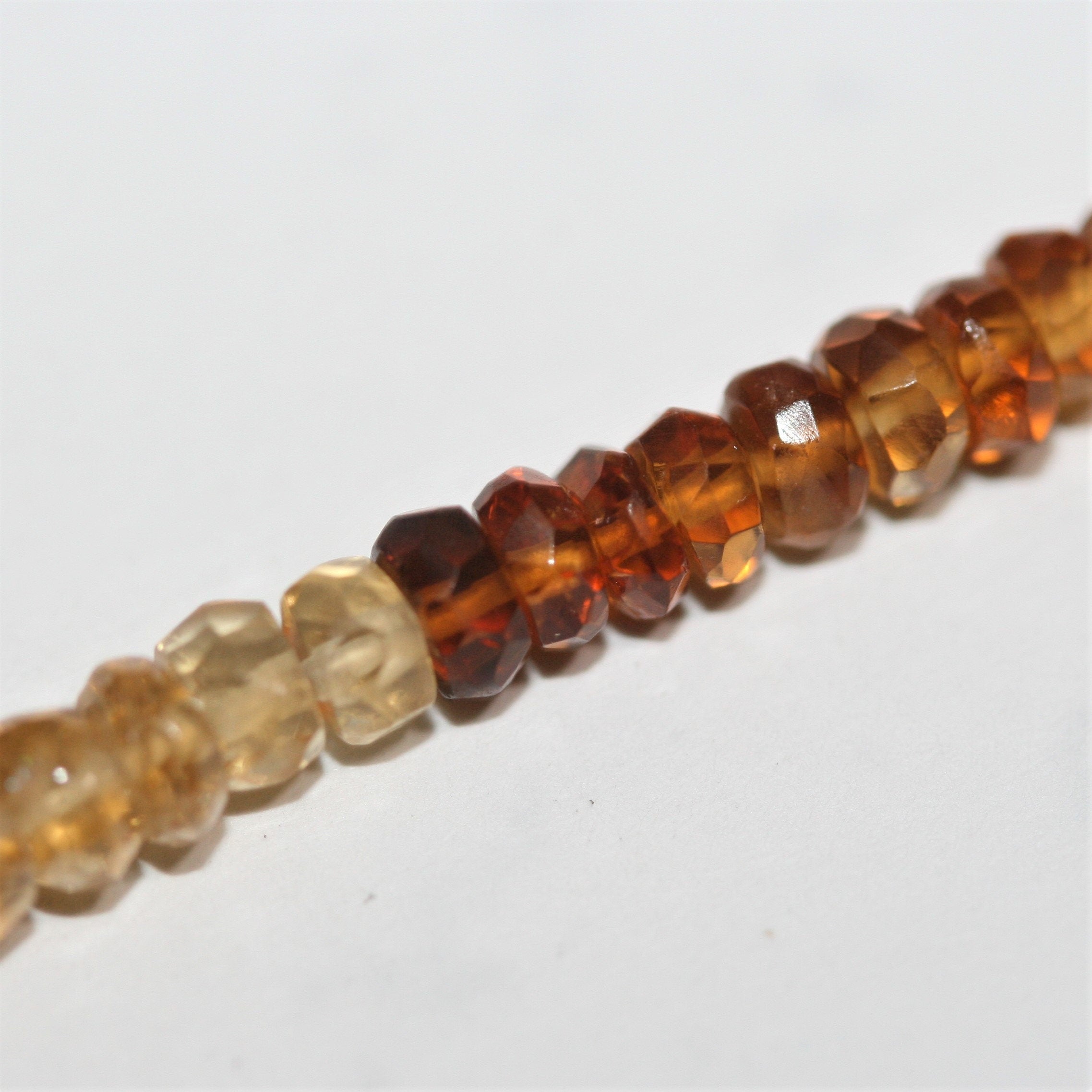 13" St Citrine Faceted Rondelle 4x2mm.-Strand 34cm.