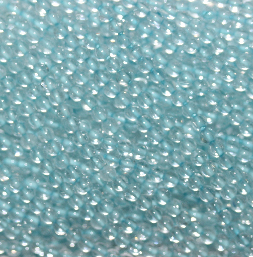 Perles rondes de topaze de 14 pouces (35,5 cm) et de 2 mm. Fournisseur de bijoux, composants pour loisirs créatifs, pierres précieuses naturelles.