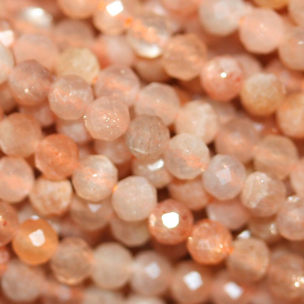 15" Brin de perles rondes à facettes en pierre de soleil brune de 3 mm.