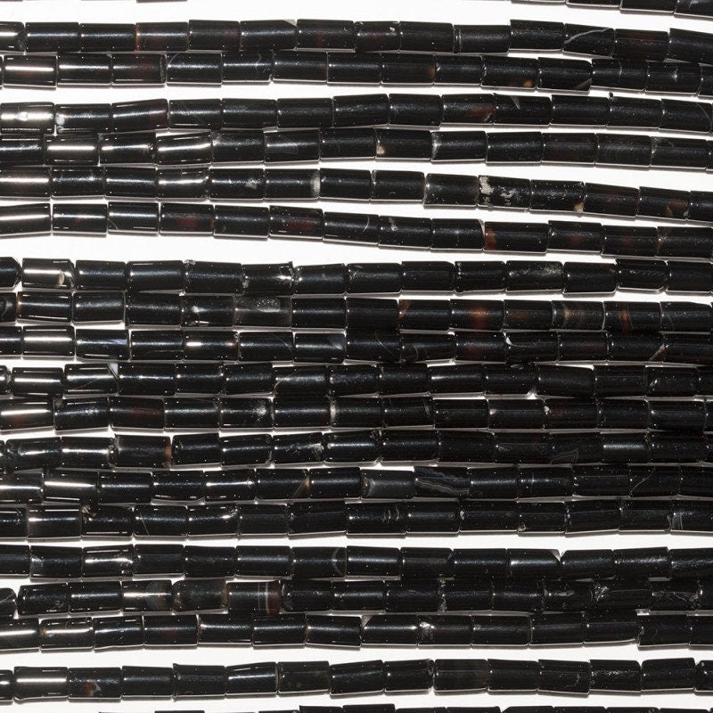 Cuentas de tubo liso de ónix St. de 16", 5 x 3 mm. Tira de 40 cm.