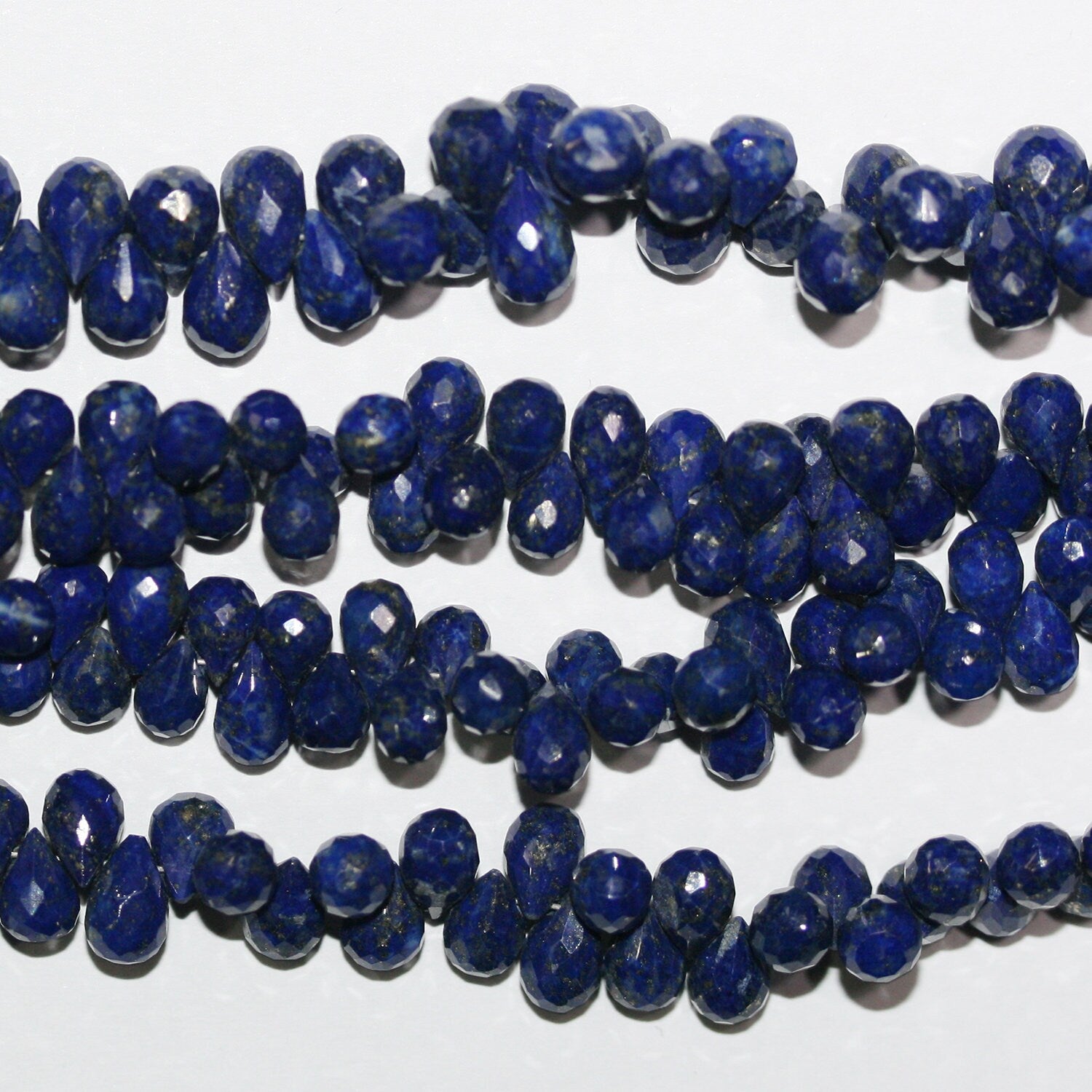 Perles en lapis-lazuli facettées de 8 pouces, 7 x 5 mm - Fil de 20 cm.
