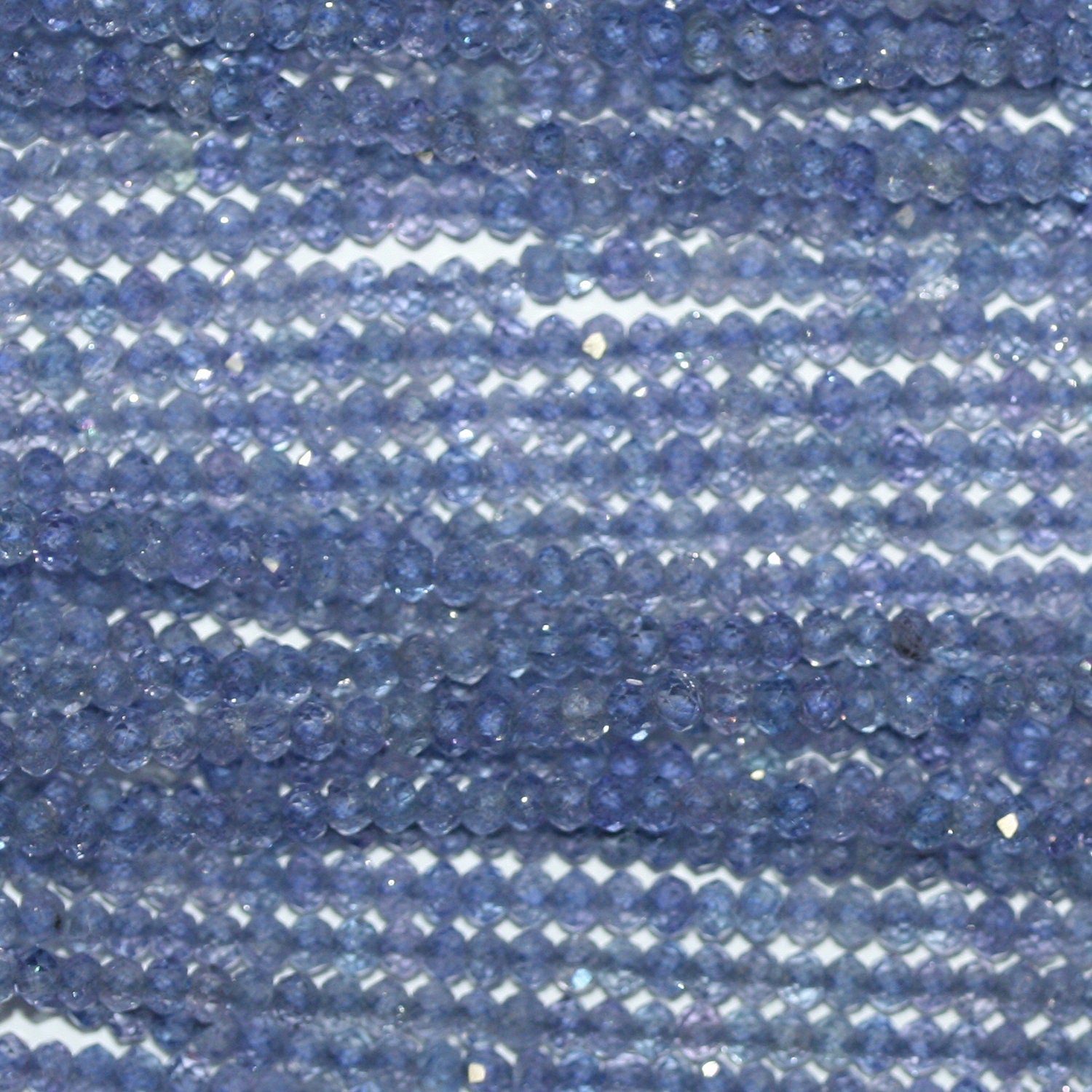 13" St Tanzanite Faceted Rondelle Beads 2x1mm.-Strand 33cm.