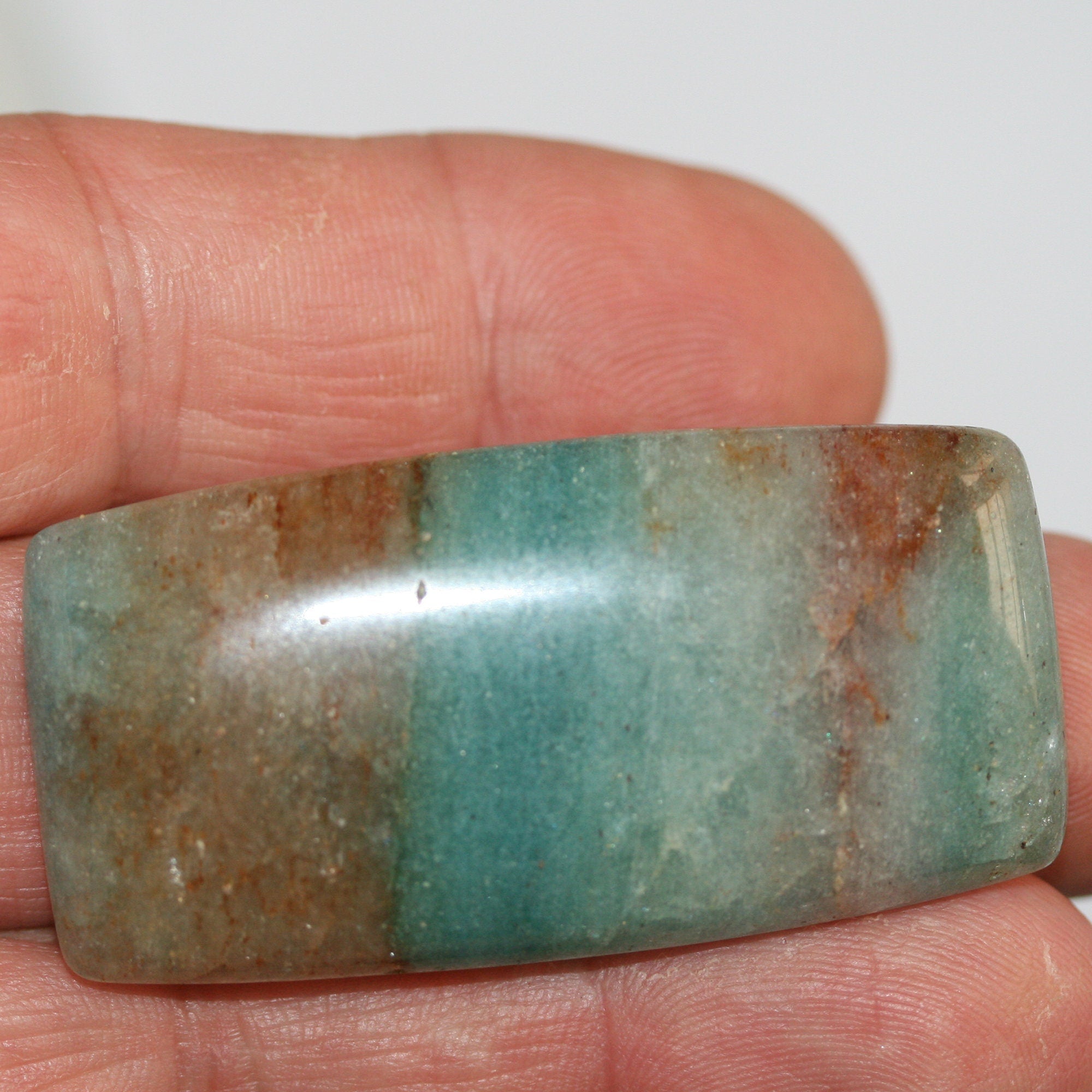 Cabochon rectangulaire lisse en amazonite 55,5 x 27,5 mm.