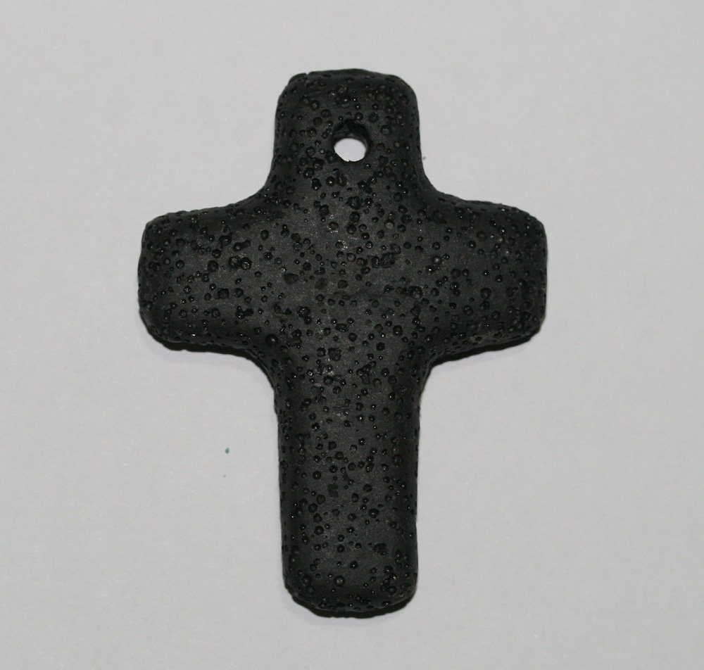 Colgante Cruz de Lava 65x50mm.