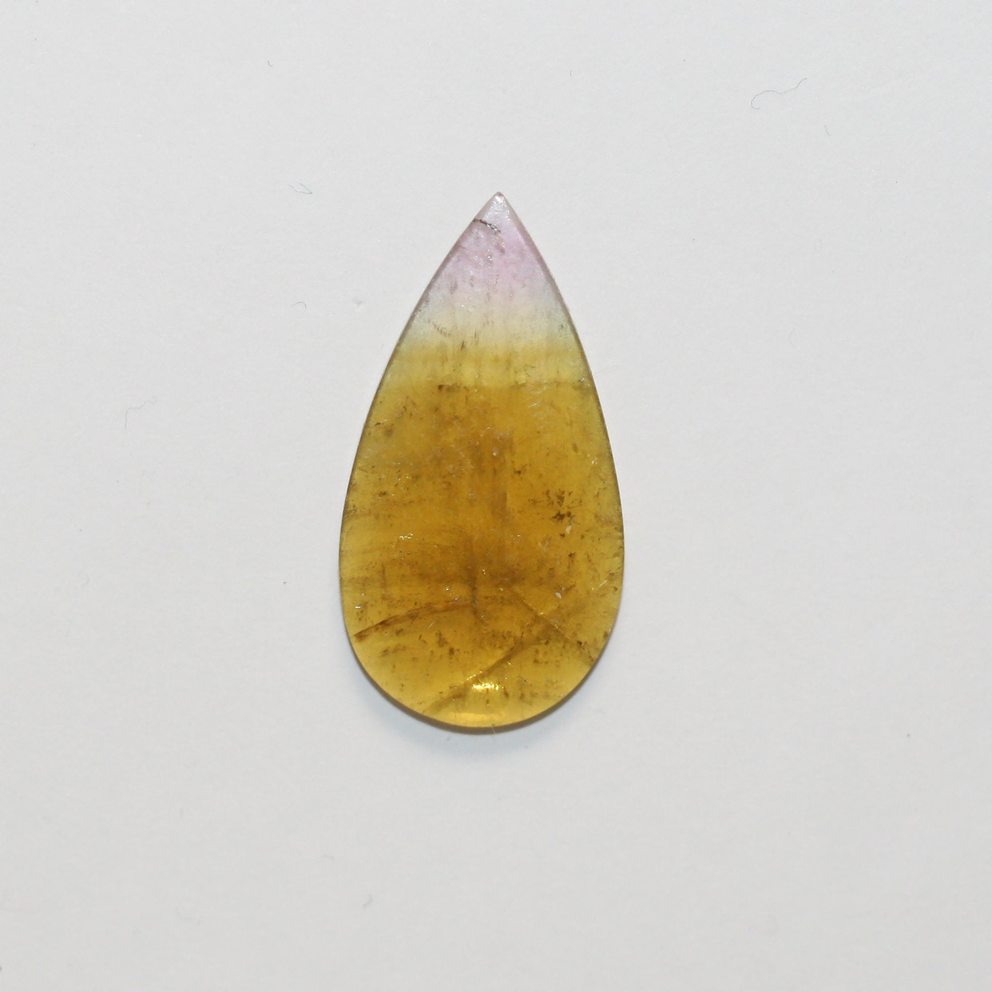 Cabochon plat en forme de goutte de tourmaline brune 23x12mm.(5,2ct.).