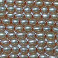 Perles ovales brunes d'eau douce, 40 cm (16 pouces), 6 x 5 mm, en rang de 40 cm. Perles naturelles à prix de gros.