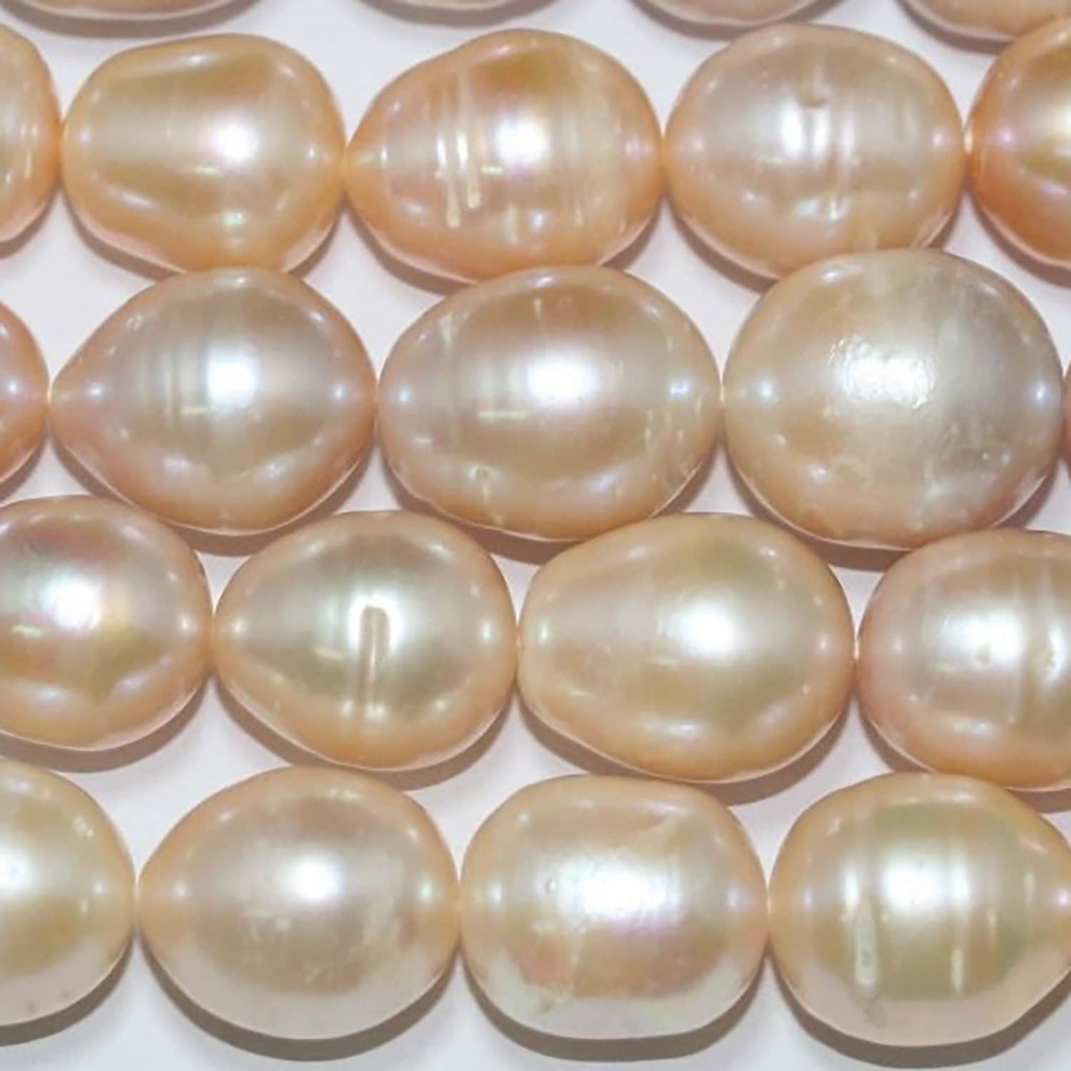 Perla ovalada de salmón de agua dulce de 16" (12-13 mm) - Hilo de 40 cm