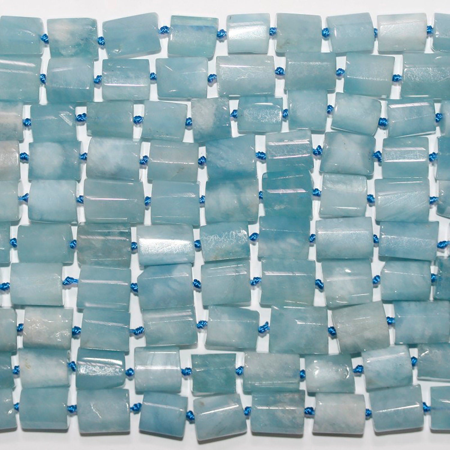 Cuentas tubulares facetadas de aguamarina Santa de 17", 11 x 9 mm aprox. - Hilo de 42 cm.