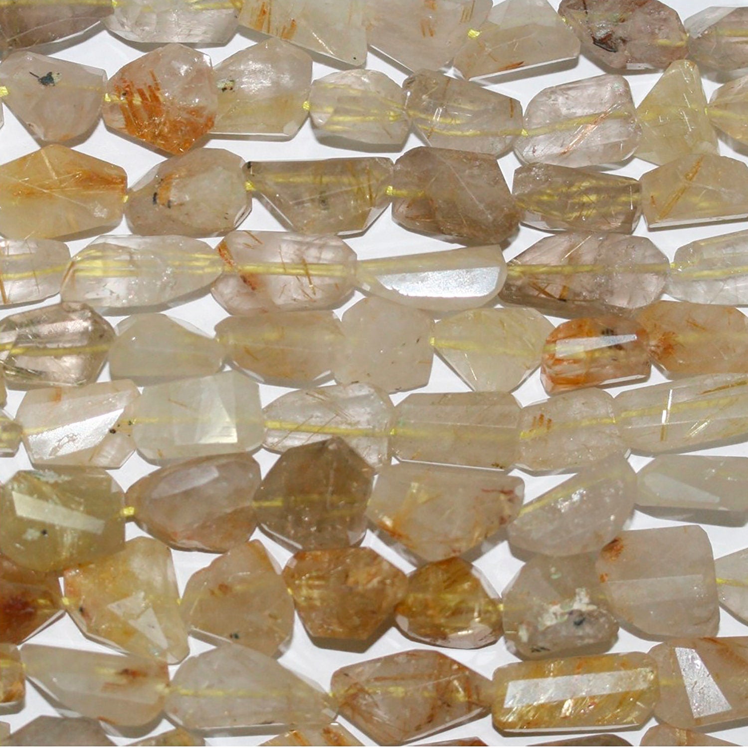 Perles de quartz rutile facettées en forme de pépites, 14 x 8 mm environ - Longueur du fil : 35 cm