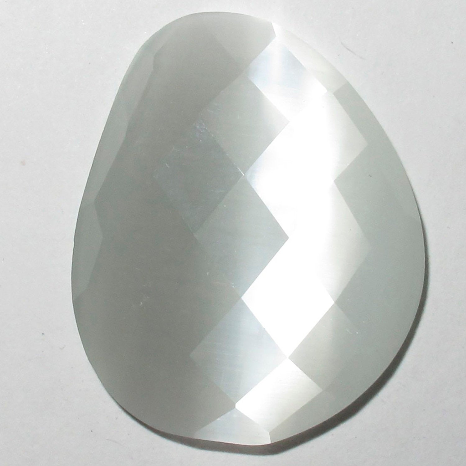 Lote de 4 cabujones ovalados de calcedonia gris hidrotermal de 20 x 25 mm. (4 uds.)