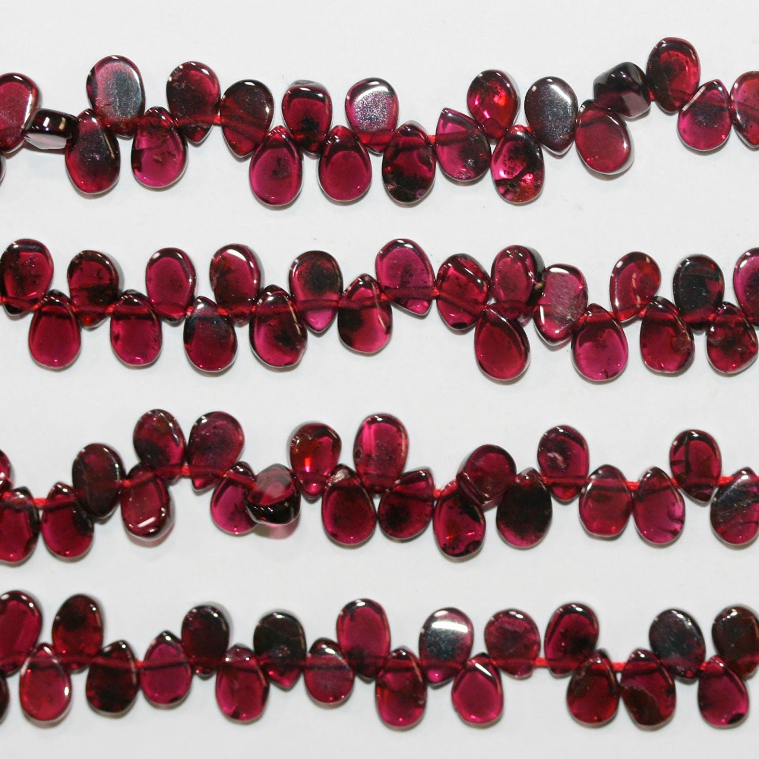 12" St Garnet Smooth Flat Drop  Beads 6x4mm.- Strand 39cm