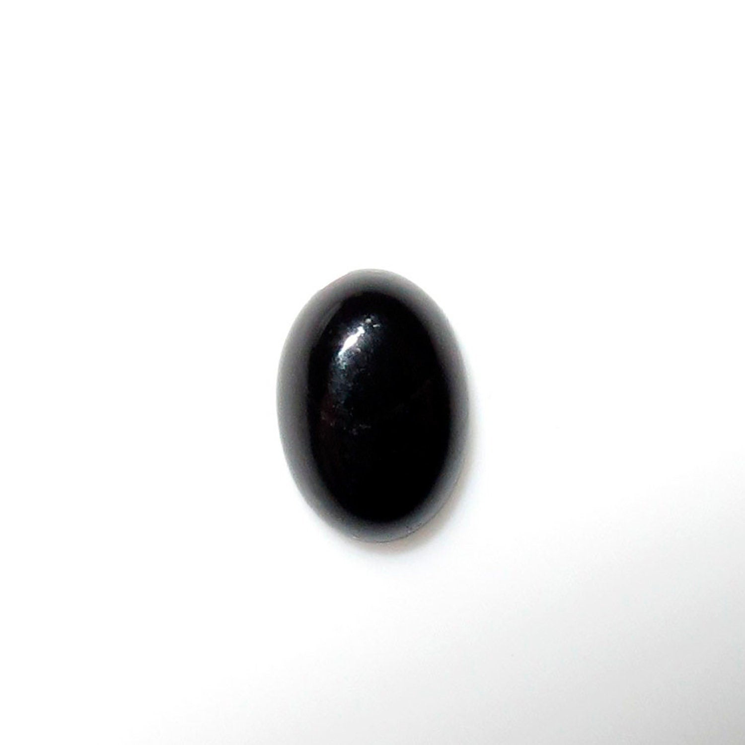 Lote de 25 cabujones ovalados de ónix de 7 x 5 mm. (25 uds.)