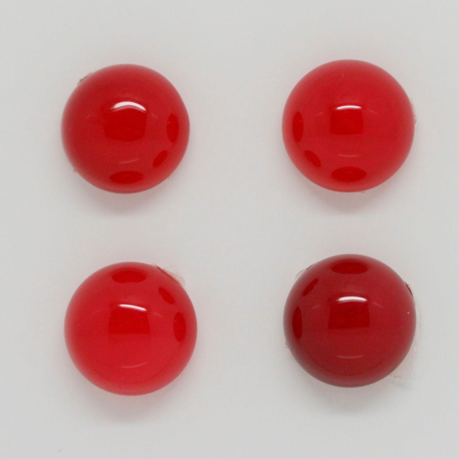 Lote de 4 cabujones redondos de calcedonia roja de 12 mm. (4 uds.)