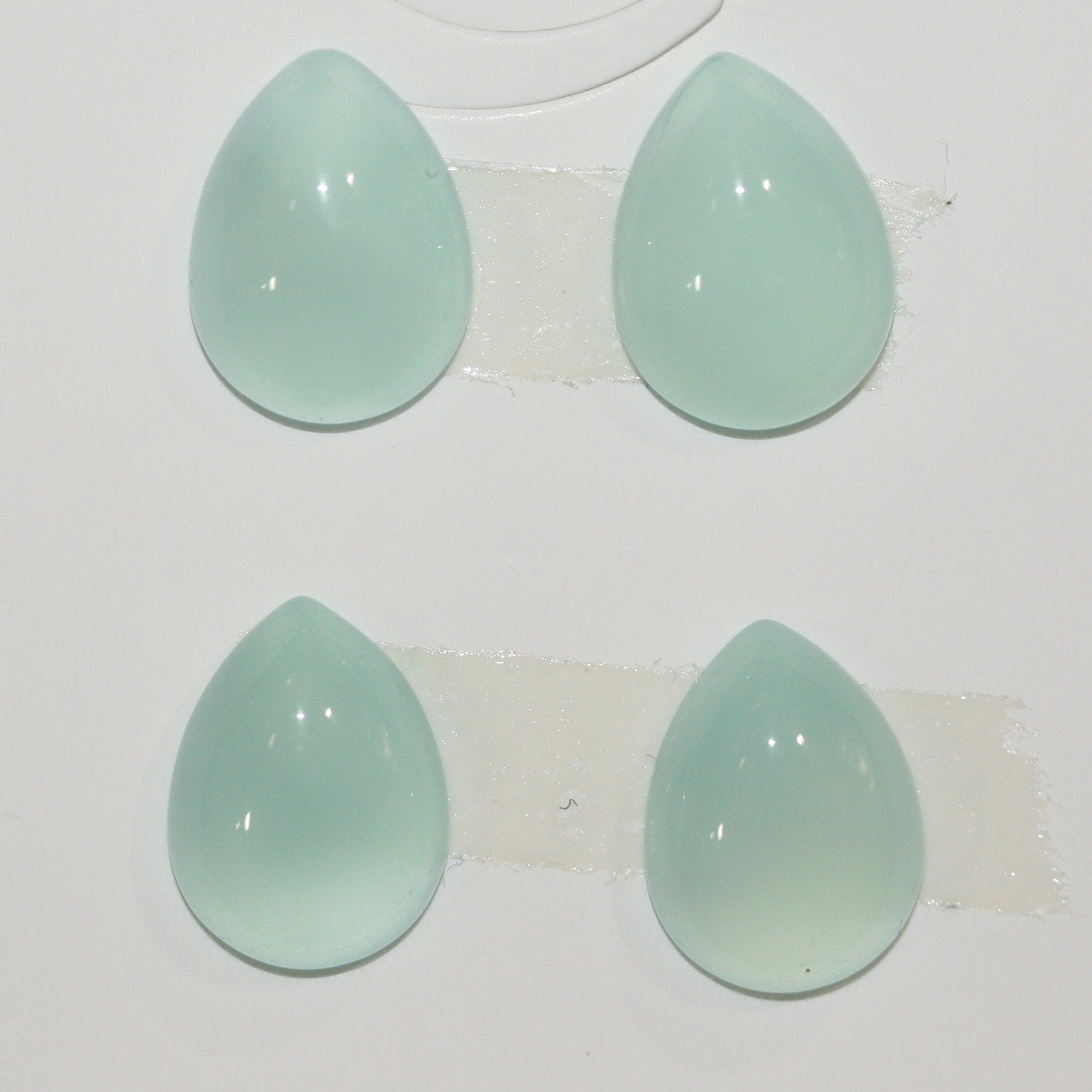 Lote de 4 cabujones de calcedonia azul verdosa, 16 x 12 mm. (4 unidades)