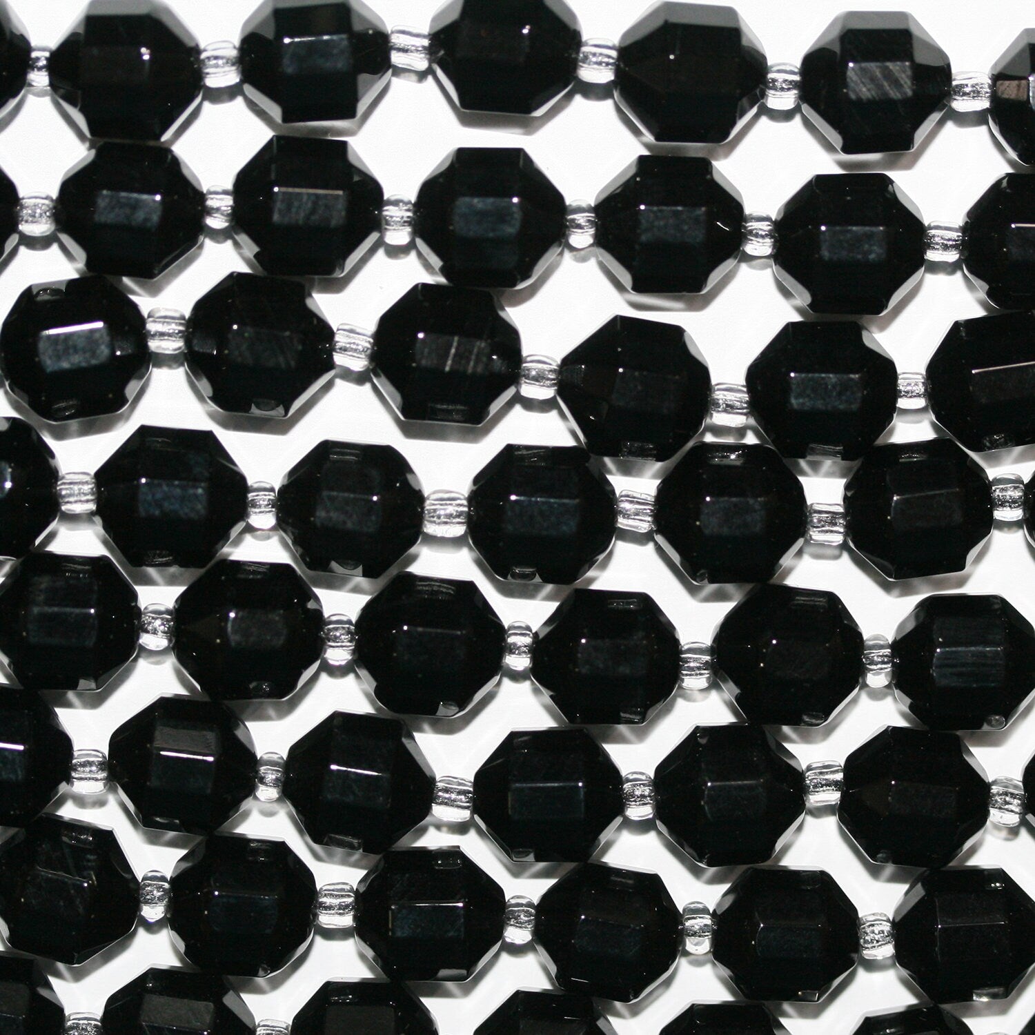Perles cylindriques à facettes en onyx St de 14 pouces, 10 x 9 mm. - Fil de 38 cm.