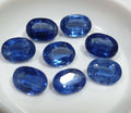 Lote de 8 piedras de cianita azul oscuro natural, facetadas y ovaladas, de 7 x 5 mm, de Brasil. Gemas naturales sin tratar.