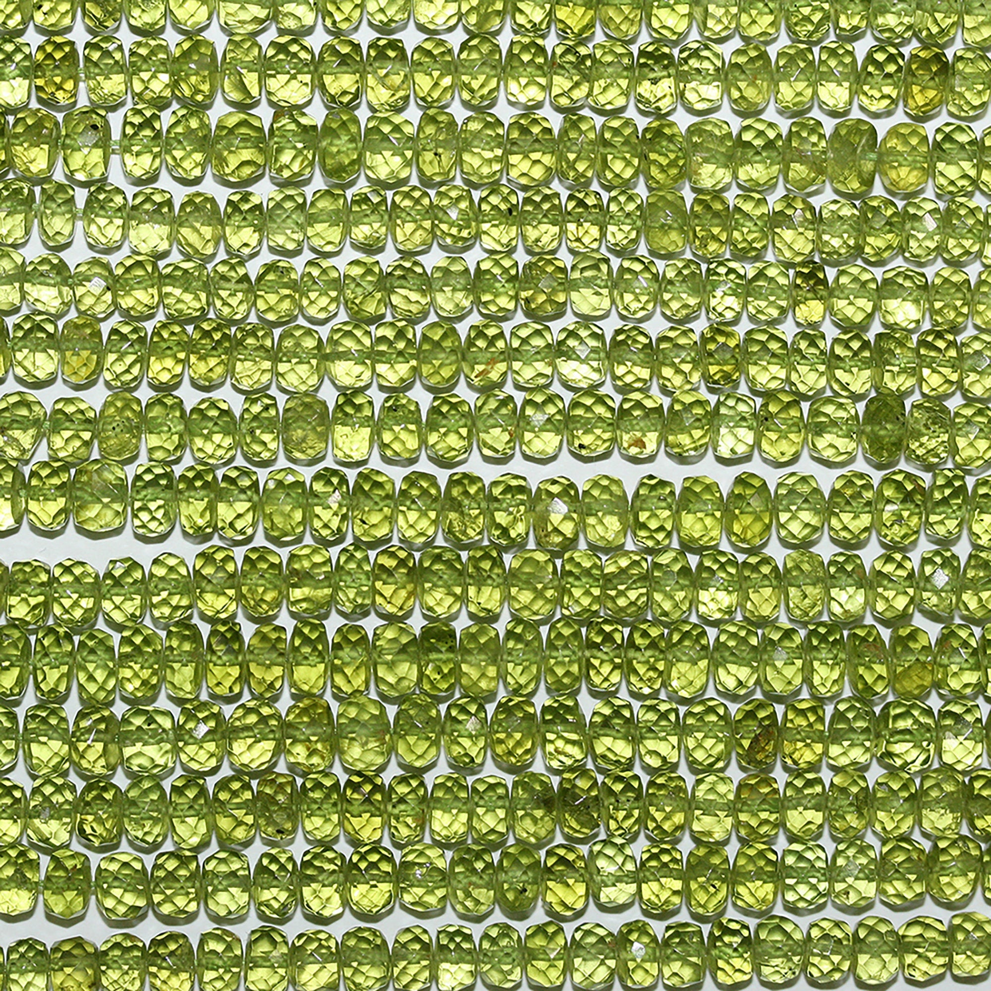 13" St Peridot Faceted Rondelle Beads 5x3mm.-Strand 34cm.
