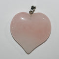 Pendentif cœur lisse en quartz rose 40 mm.