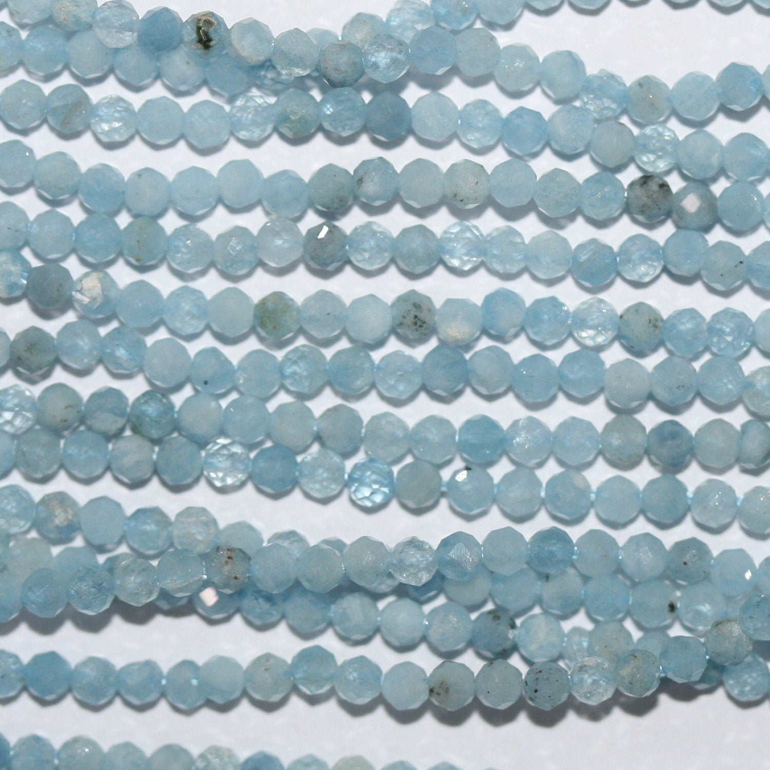14" St Aquamarine Faceted Round Beads 2-2.5mm.-Strand 38cm