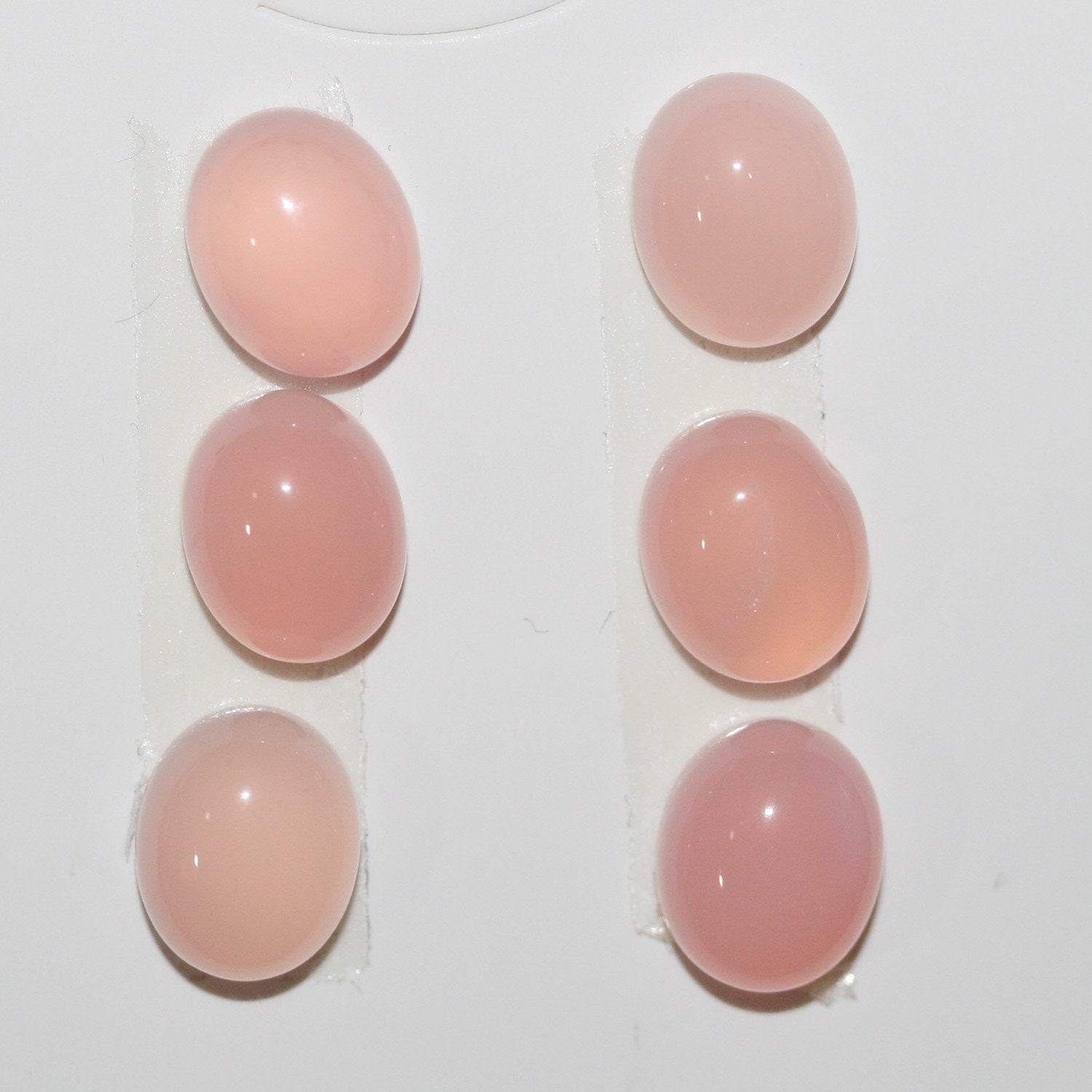 Lote de 6 cabujones ovalados de calcedonia rosa de 11 x 9 mm. (6 piezas)