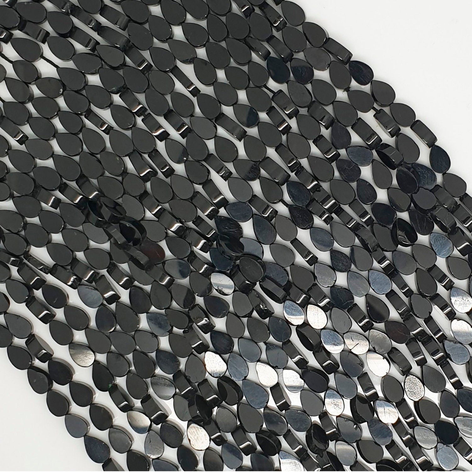 10" St Spinel Smooth Drop Beads 6x4mm.-Strand 34mm