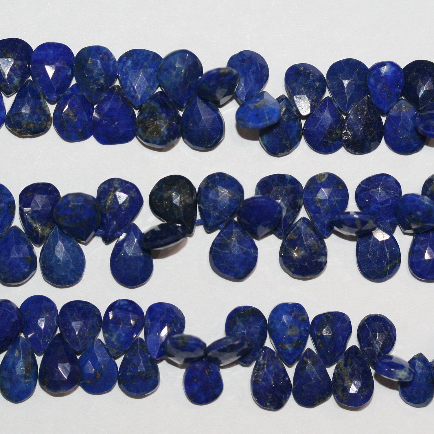 Perles en lapis-lazuli facettées de 8 pouces, 10 x 8 mm - Fil de 20 cm.