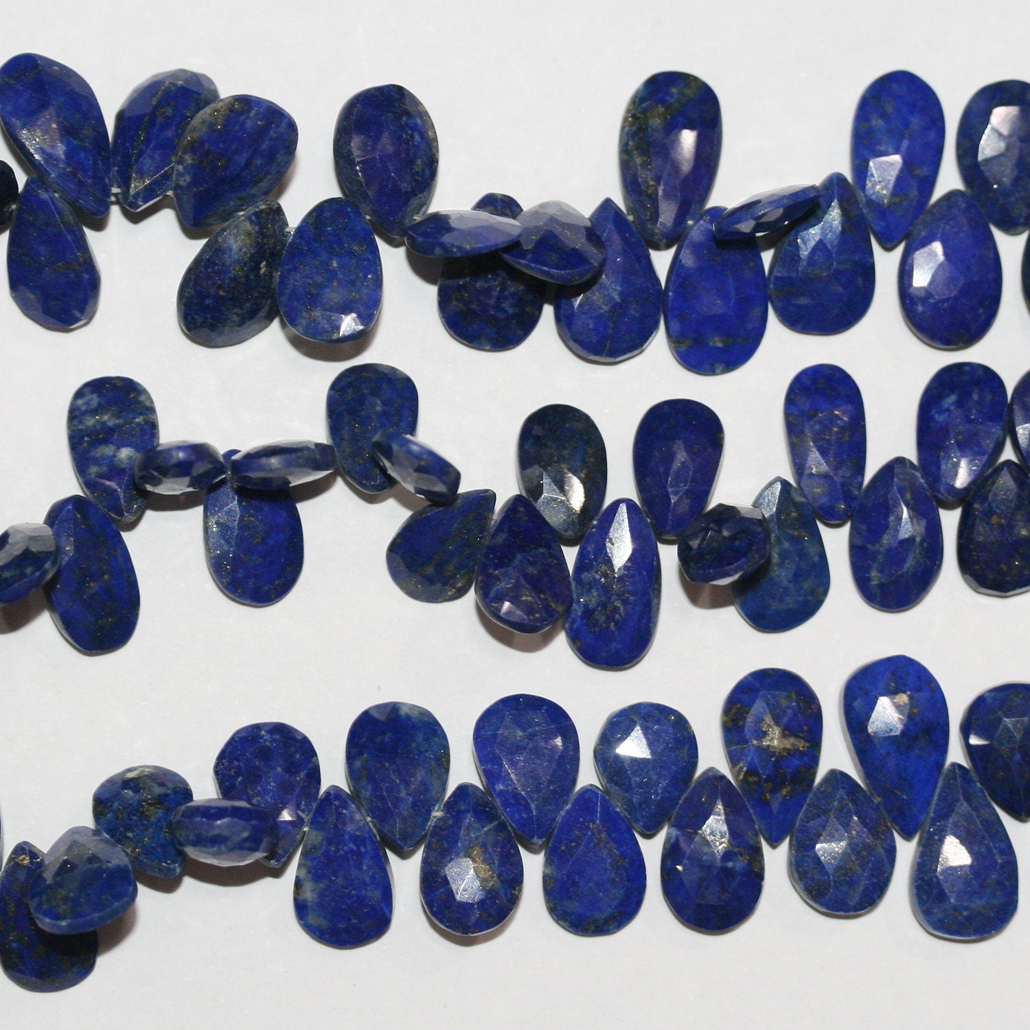 Perles en lapis-lazuli facettées de 8 pouces, 12 x 8 mm - Fil de 20 cm.