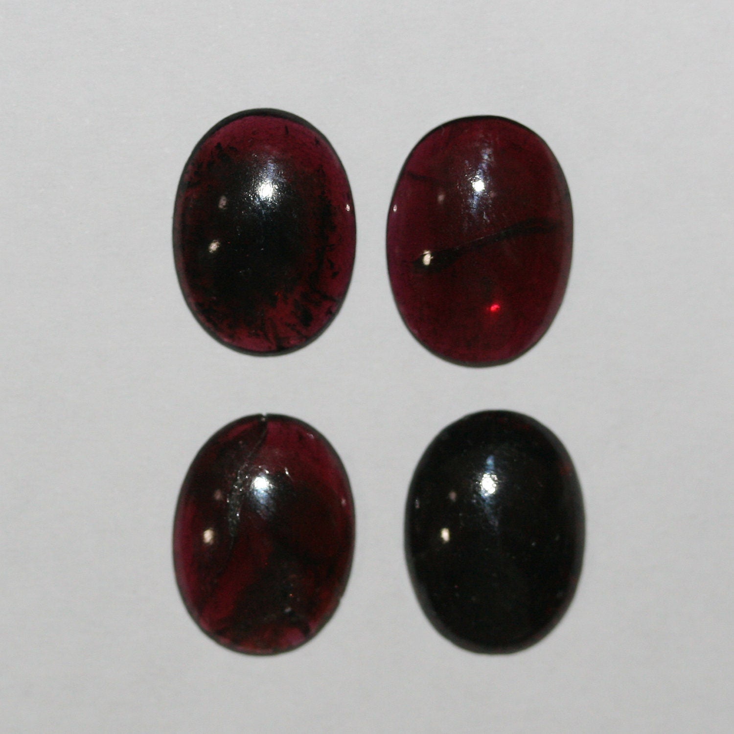 Lote de 4 cabujones ovalados de granate de 14 x 10 mm (4 piezas)